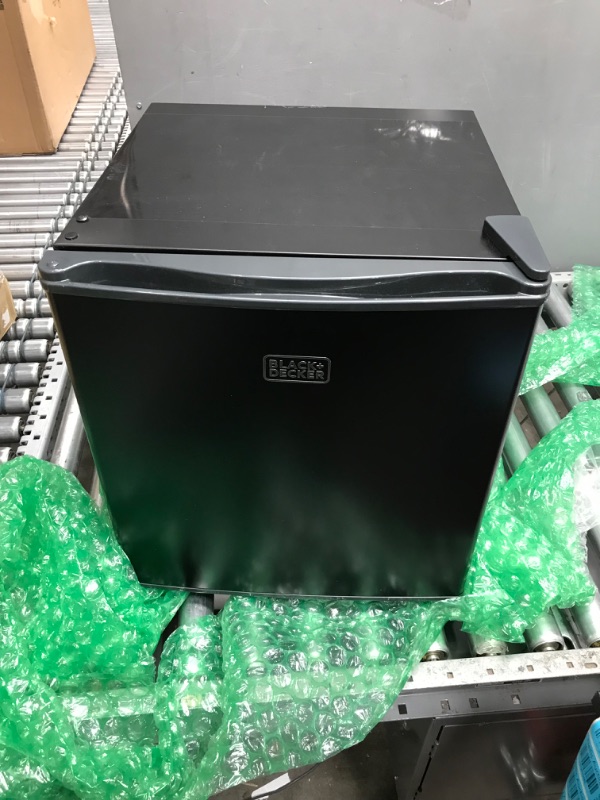 Photo 2 of 
BLACK+DECKER BCRK17B Compact Refrigerator Energy Star Single Door Mini Fridge with Freezer, 1.7 Cubic Feet, Black
Color:Black
Style:Mini Fridge