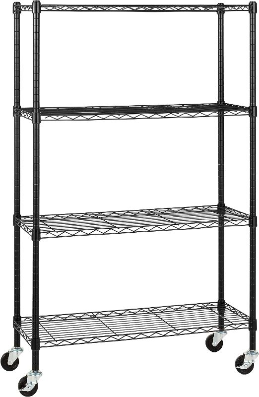 Photo 1 of Amazon Basics 4-Shelf Heavy Duty Shelving Storage Unit on 3'' Wheel Casters, Metal Organizer Wire Rack - Chrome Silver