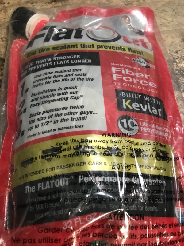 Photo 2 of FlatOut Multi-Purpose Tire Sealant - Prevents and Repairs Flat Tires, Seals Leaks, Contains Kevlar, 32-Ounce Bag, 1-Pack 1-Pack (32 oz. Tire Sealant)