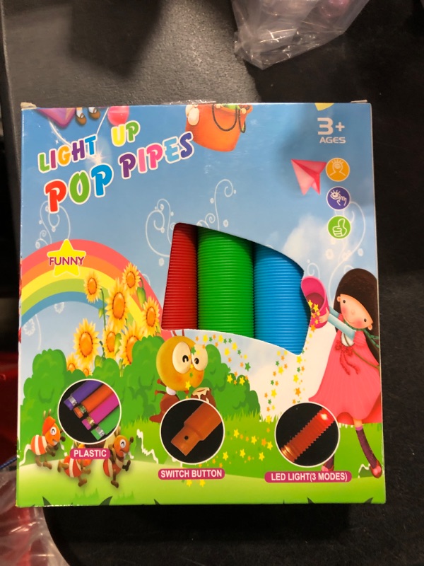 Photo 2 of 12 Pack Neudeco Light up pop Tubes Fidget Sensory Toys,Led Light up Kids' Birthday Party Favors,Glow in The Dark Party suppliers,Light up pop Pipes Toys?Party Bag Stuffers Birthday Gift for Kids