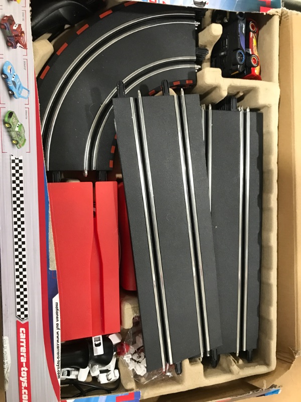 Photo 3 of Carrera Go Battery Operated Disney Pixar Cars Track Action Electric Powered Slot Car Race Track with Jump Ramp Set