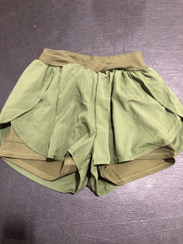 Photo 1 of WOMEN'S SKORT. GREEN. SIZE LARGE. 