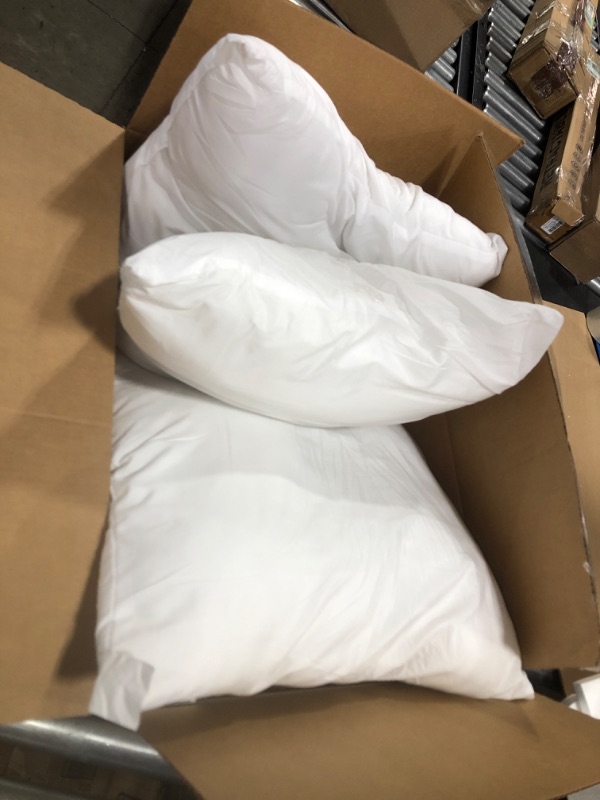Photo 1 of 4 PACK OF UNKNOWN SIZED PILLOWS 