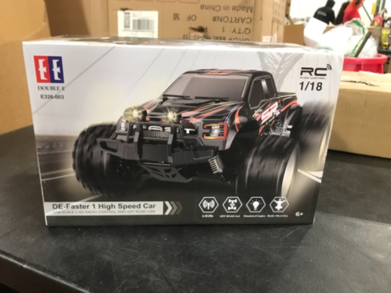 Photo 2 of DOUBLE E Remote Control Car,4WD Off Road RC Monster Car 20 KM/H High Speed Vehicle Truck with Rechargeable Battery for Boys Kids (red)