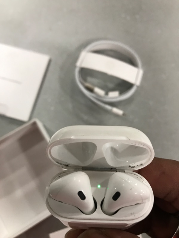 Photo 2 of Apple AirPods with Charging Case (Latest Model)