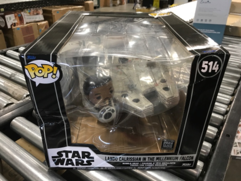 Photo 1 of Funko Pop! Ride Super Deluxe: Star Wars - Lando Calrissian in The Millenium Falcon (Shared Galactic Convention, Amazon Exclusive), Multicolor