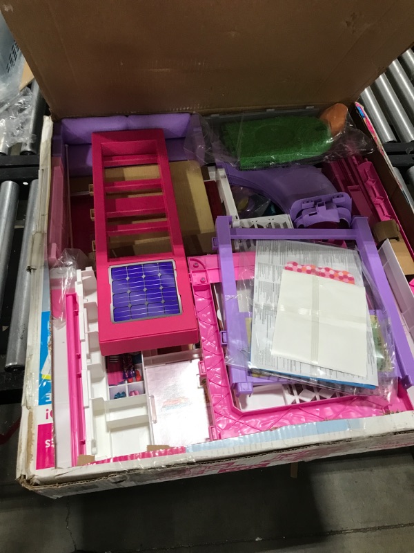 Photo 1 of Barbie DreamHouse Dollhouse with 70+ Accessories, Working Elevator & Slide, Transforming Furniture, Lights & Sounds Wheelchair Accessible Elevator