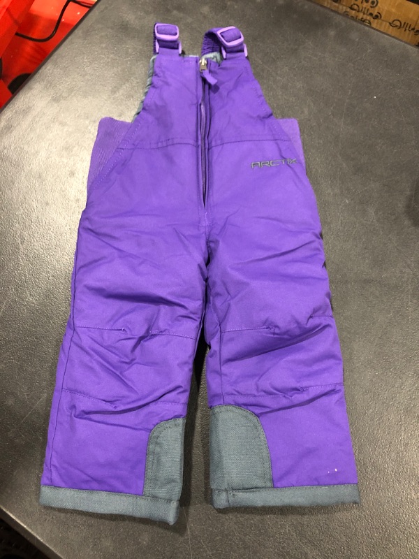 Photo 2 of Arctix Toddler Chest High Bib Overalls Purple, 2T

