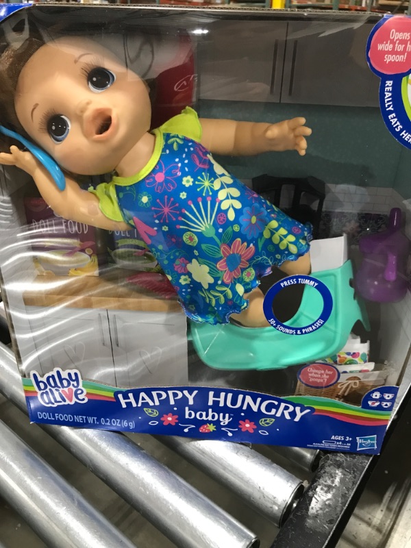 Photo 2 of Baby Alive Happy Hungry Baby Brown Straight Hair Doll, Makes 50+ Sounds & Phrases, Eats & Poops, Drinks & Wets, for Kids Age 3 & Up Standard