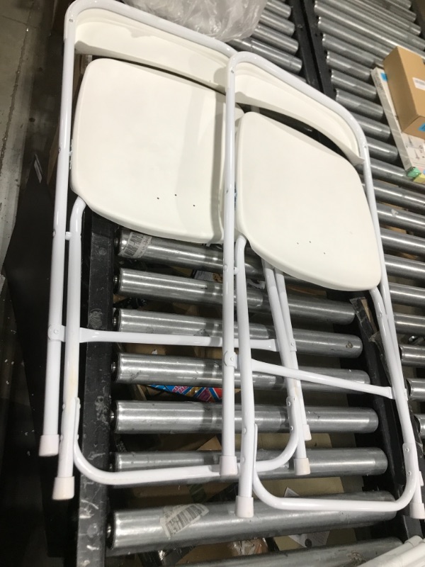 Photo 2 of 2 PIECE
Plastic Folding Chair, 800 lbs. Capacity, White - 