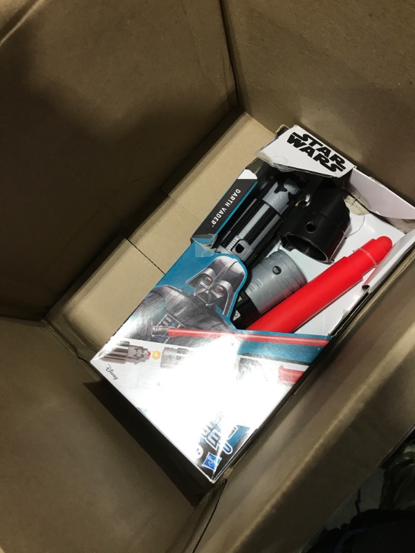 Photo 1 of Star Wars Lightsaber Forge Darth Vader Electronic Extendable Red Lightsaber Toy, Customizable Roleplay Toy for Kids Ages 4 and Up Standard