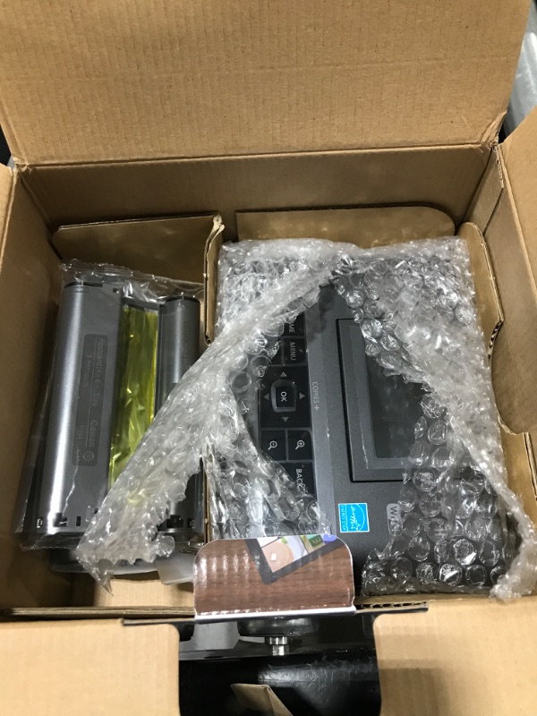 Photo 1 of Canon SELPHY CP1300 Wireless Compact Photo Printer with AirPrint and Mopria Device Printing, with Canon KP108 Paper and Black Hard case to fit All Together (Black)