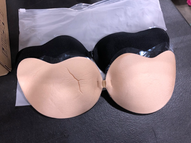 Photo 1 of 2 pairs of sticky bras size C cup- black and nude