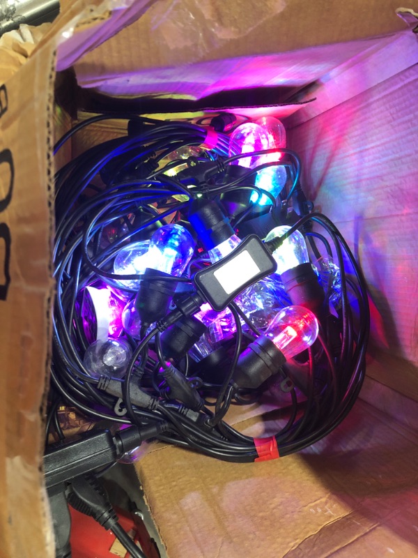 Photo 1 of 2 50 FOOT OUTDOOR REMOTE CONTROLED COLOR CHANGING LIGHTS