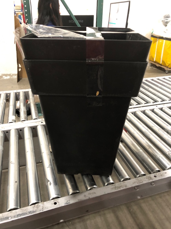 Photo 1 of 2 large black plastic planters 