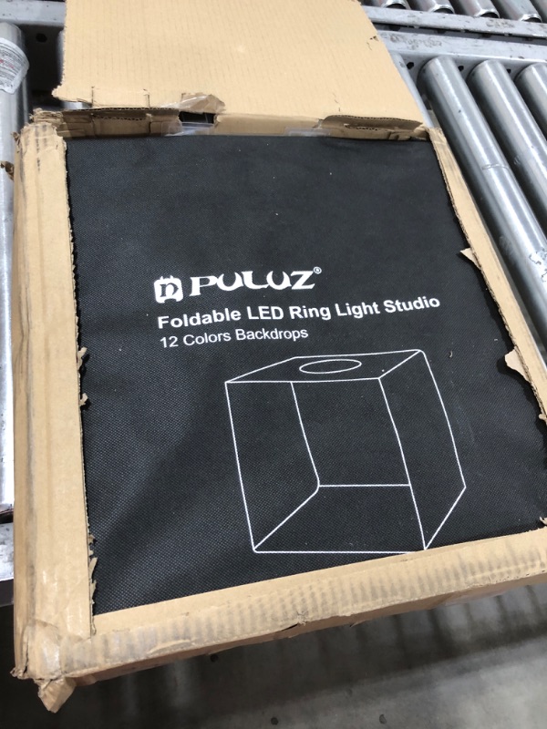 Photo 2 of PULUZ Dimmable Photo Studio Light Box 16 /40cm Portable Photography Light Tent with 6 Backdrops (12 Colors) & Soft Light Cloth for Product Display
