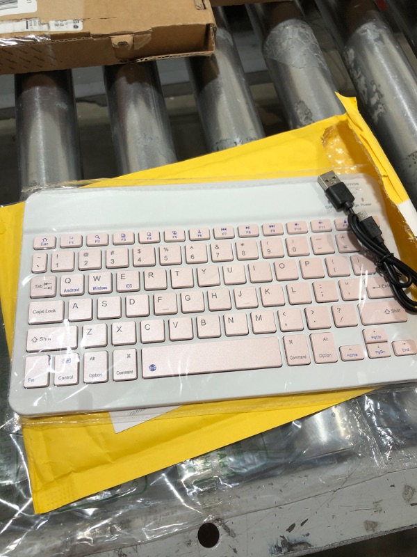 Photo 2 of Ultra-Slim Bluetooth Keyboard Portable Mini Wireless Keyboard Rechargeable for Apple iPad iPhone Samsung Tablet Phone Smartphone iOS Android Windows (10 inch Pink)