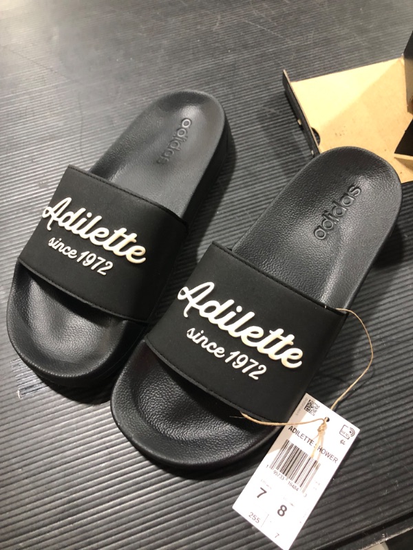 Photo 2 of adidas Unisex-Adult Adilette Shower Slide Sandal 7 Core Black/Wonder White/Core Black