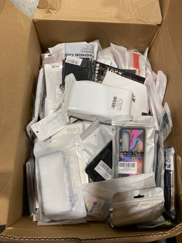 Photo 1 of BOX LOT OF APPLE WATCHES BANDS AND PHONES CASES