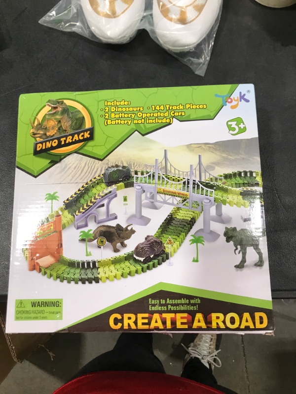 Photo 2 of Dinosaur Toys,Create A Dinosaur World Road Race,Flexible Track Playset and 2 pcs Cool Dinosaur car for 3 4 5 6 Year & Up Old boy Girls Best Gift Green