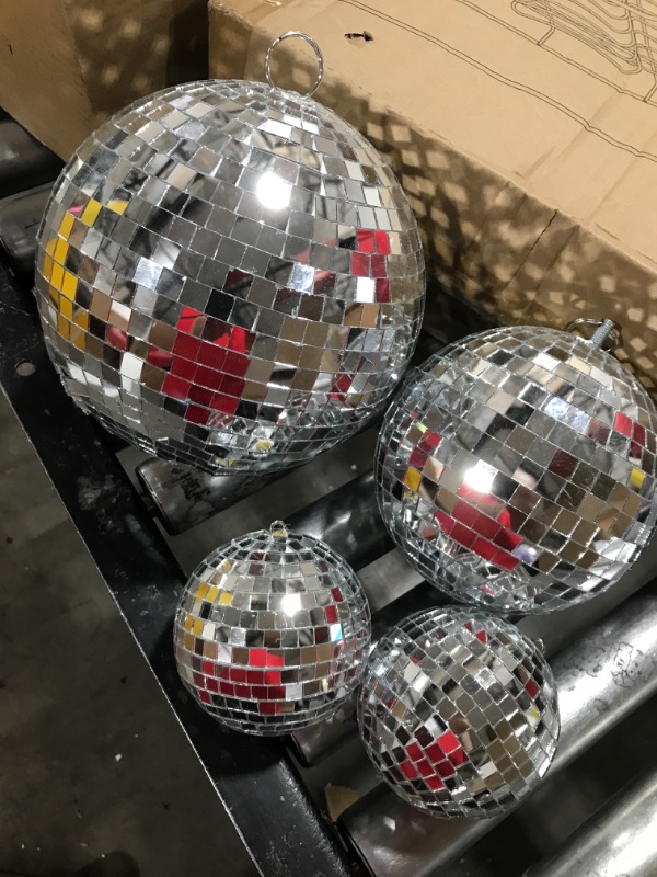 Photo 1 of 4 DISCO BALLS - 1 LARGE, 1 MEDIUM, 2 SMALL