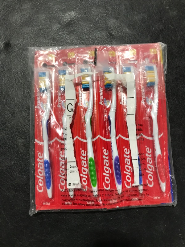 Photo 2 of 12pk of tooth brushes