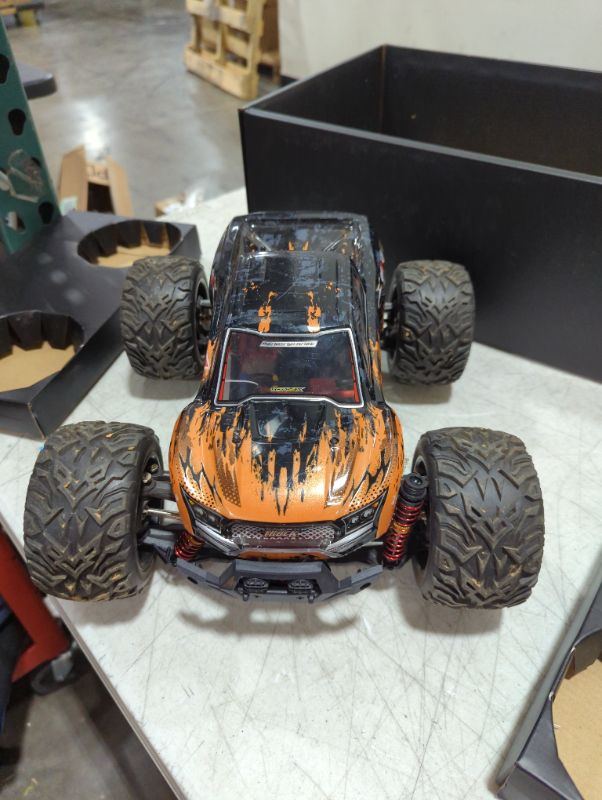 Photo 2 of BEZGAR HM123 Hobby Grade 1:12 Scale RC Trucks, 4WD High Speed 45 Km/h All Terrains Electric Toy Off Road RC Monster Truck Vehicle Car with Rechargeable Battery for Boys and Adults
