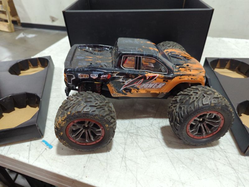 Photo 1 of BEZGAR HM123 Hobby Grade 1:12 Scale RC Trucks, 4WD High Speed 45 Km/h All Terrains Electric Toy Off Road RC Monster Truck Vehicle Car with Rechargeable Battery for Boys and Adults
