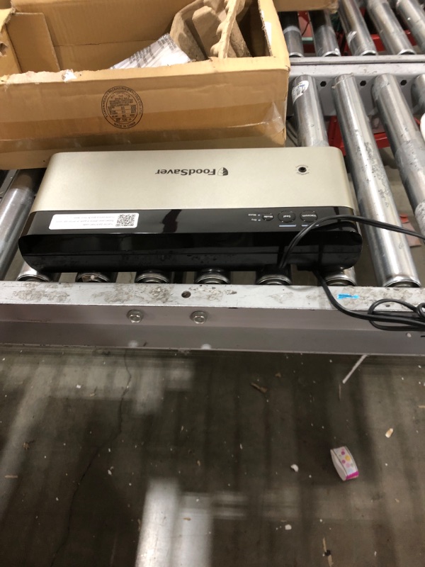 Photo 1 of FoodSaver VS0150 PowerVac Compact Vacuum Sealing Machine, Vertical Vacuum Sealer Storage, Black & FoodSaver Vacuum Sealer Bags for Airtight Food Storage and Sous Vide, 1 Quart Precut Bags (44 Count) Black Sealing Machine + Seal Bags, 44 Count