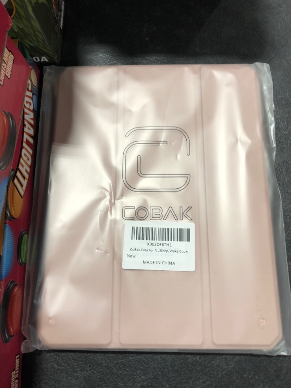 Photo 2 of CoBak Case for New iPad 10th Generation 10.9 Inch 2022 - Shockproof Cover with Clear Transparent Back Shell with Pencil Holder, Auto Sleep/Wake Cover Rose Gold