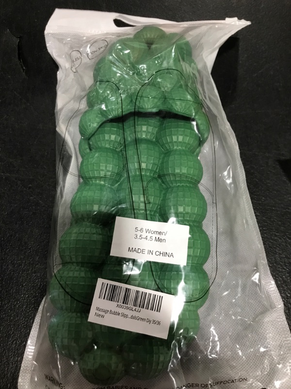 Photo 1 of GREEN MASSAGE BUBBLE SLIPPERS
SIZE 5-6