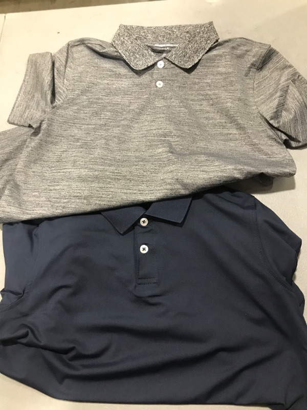 Photo 1 of 2 Pair of Polo Shirts
size L KIDS