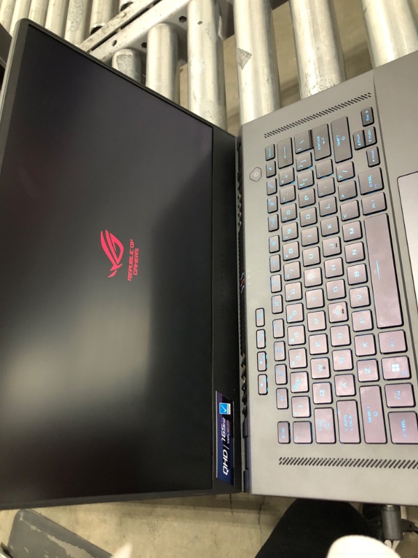 Photo 2 of Asus ROG Zephyrus G15 15.6'' 165Hz QHD (2560x1440) Slim Gaming Laptop, 8 Cores AMD Ryzen 9 5900HS, GeForce RTX 3060, 100% DCI-P3 Pantone, RGB Backlit KB, Wi-Fi 6 (24GB RAM | 1TB PCIe SSD)