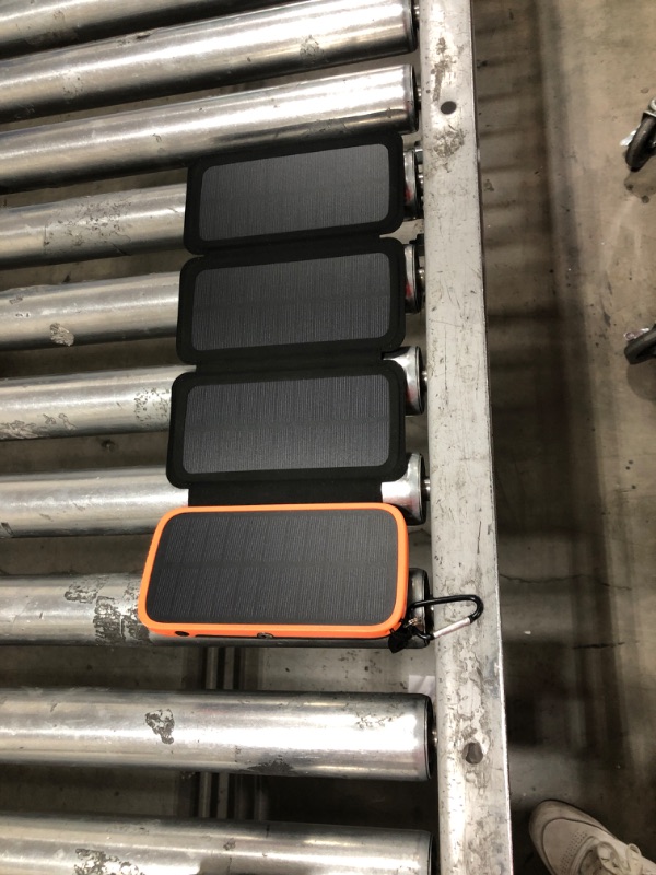 Photo 1 of Solar Charger Power Bank 27000mAh – CONXWAN 3A Fast Charging Solar Phone Charger with 3 USB Outputs & 4 Solar Panels USB C External Backup Battery Pack for Smart Phone Tablet Orange