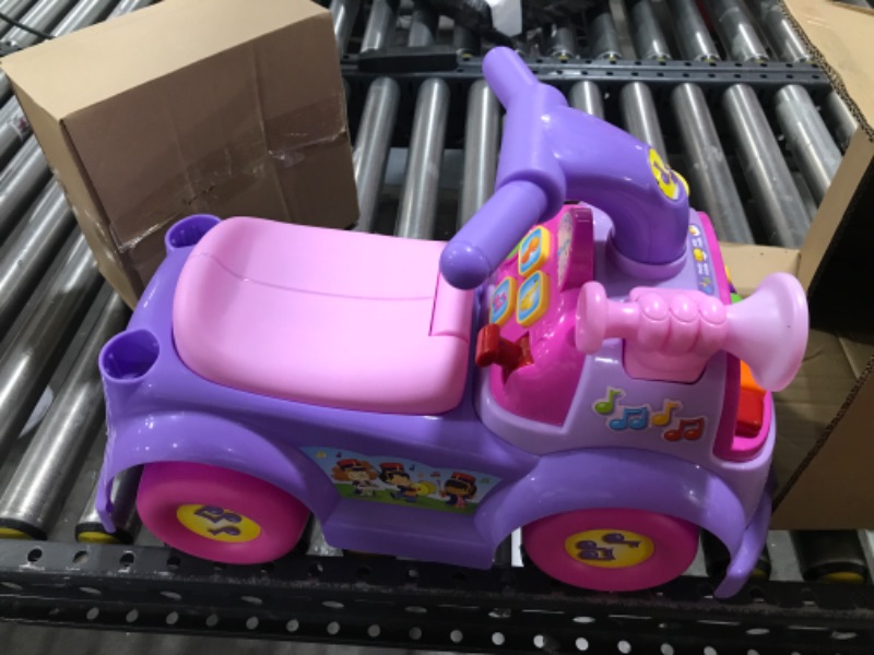 Photo 2 of Fisher Price Music Parade Purple Ride-On with 5 Different Marching Tunes! [Amazon Exclusive]