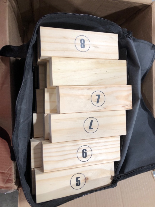 Photo 1 of Giant Tumbling Timber Toy - Jumbo JR. Wooden Blocks Floor Game for Kids and Adults, 56 Pieces, Premium Pine Wood, Carry Bag - Grows from 2-feet to Over 4-feet While Playing, Life Size Yard Tower Game