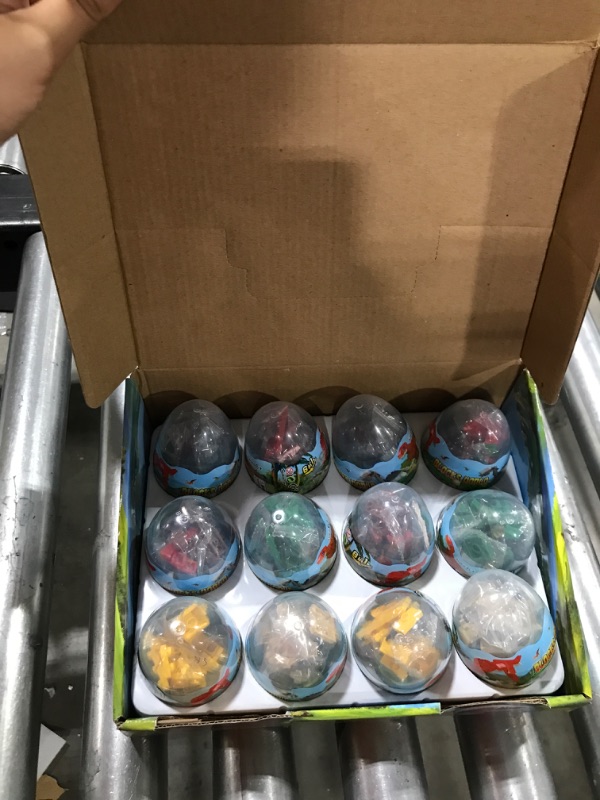 Photo 1 of 12Pcs Prefilled Easter Eggs with Toys Inside Dinosaur Building Blocks Easter Basket Stuffer Easter Egg Filler Surprise Egg for Kid Egg Hunt Easter Party Favors for Kid Boy Girl Easter Gift Class Prize Dinosaur Easter Eggs