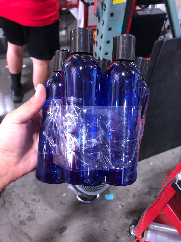 Photo 1 of 5 pack plastic bottles  