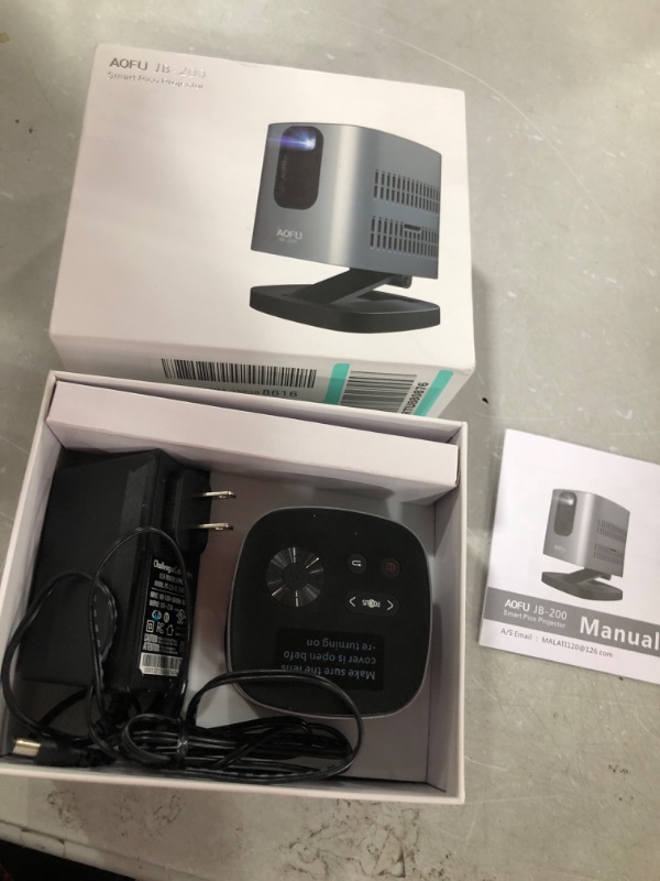 Photo 1 of Wi-Fi Smart Mini Projector, 150 ANSI Lumens Portable Projector, Native 720p Full HD Resolution, Movie Projector, 110 Inch Picture, Outdoor or Home Projector, Conference Equipment
