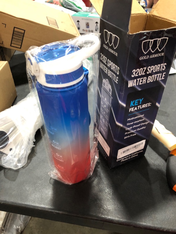 Photo 1 of 32 OZ WATER BOTTLE  BLUE/RED
