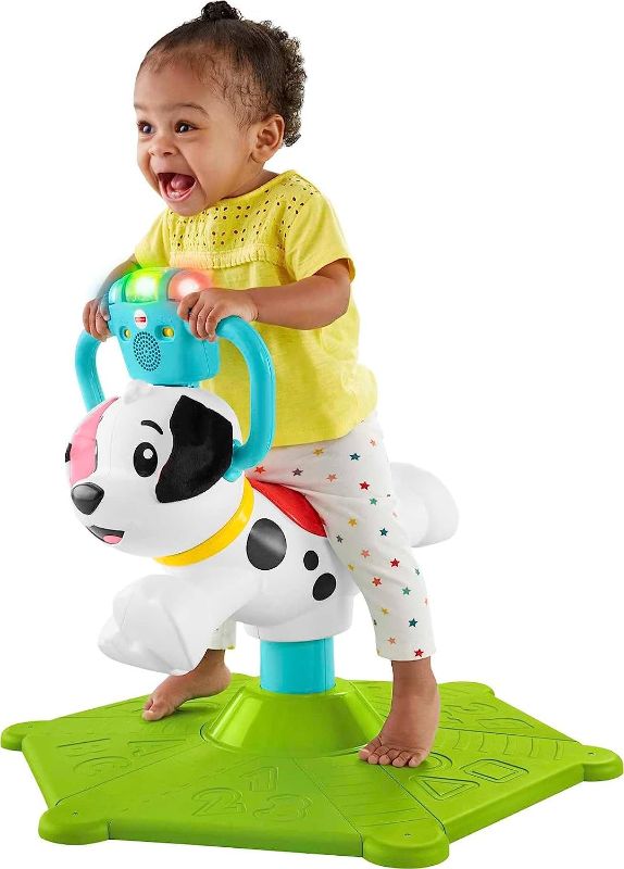 Photo 1 of Fisher-Price Toddler Ride-On Learning Toy, Bounce and Spin Puppy Stationary Musical Bouncer for Babies and Toddlers Ages 12+ Months
