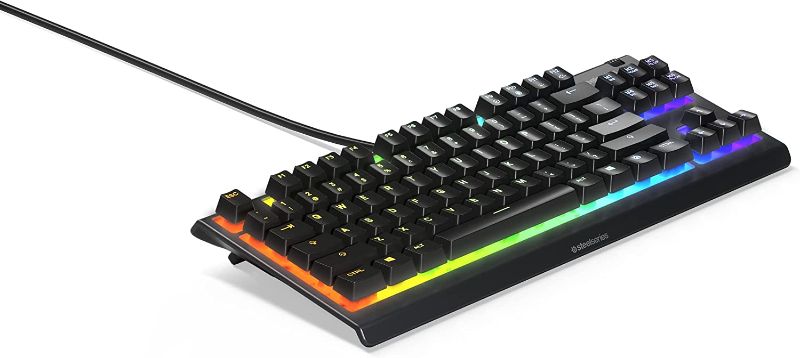 Photo 1 of SteelSeries Apex 3 TKL RGB Gaming Keyboard – Tenkeyless Compact Form Factor - 8-Zone RGB Illumination – IP32 Water & Dust Resistant – Whisper Quiet Gaming Switch – Gaming Grade Anti-Ghosting (Renewed)
