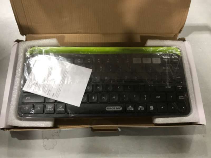 Photo 2 of “Panthe” Bluetooth Keyboard, Mini Multi-Device Wireless Keyboard for iPad Tablet Laptop Phone TV, Connect up to 3 Devices, with Tablet Holder, Compatible with Windows, Mac, Chrome OS, iOS, Android
