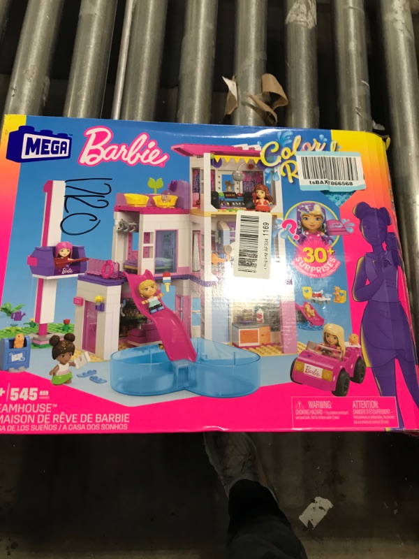 Photo 2 of Mega Barbie Color Reveal Building Toys Dreamhouse with 30+ Surprises, 5 Micro Dolls and 6 Pets, Ages 4 and up Barbie Dreamhouse (with Color Reveal)