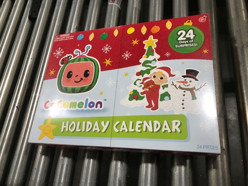 Photo 2 of CoComelon 2022 Holiday Advent Calendar for Kids, 24 Piece Gift Playset - Set Includes Articulated Character Action Figures & Toy Accessories for Kids and Preschoolers