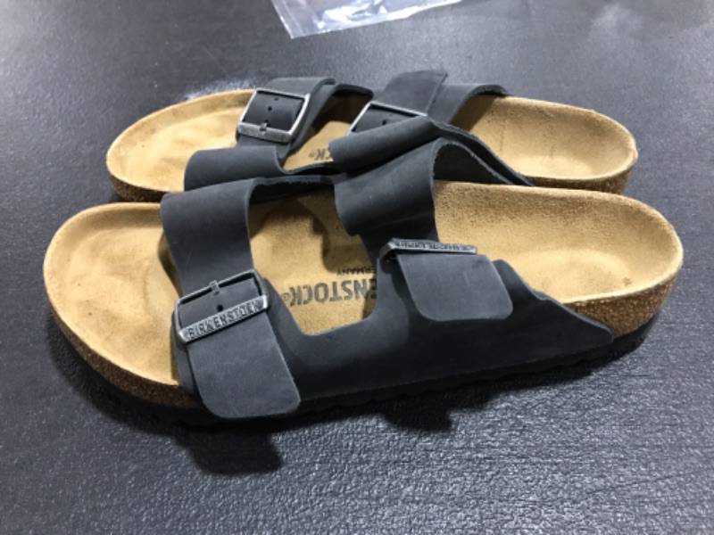 Photo 2 of BIRKENSTOCK SANDALS. BLACK. SIZE 39. PRIOR USE. 