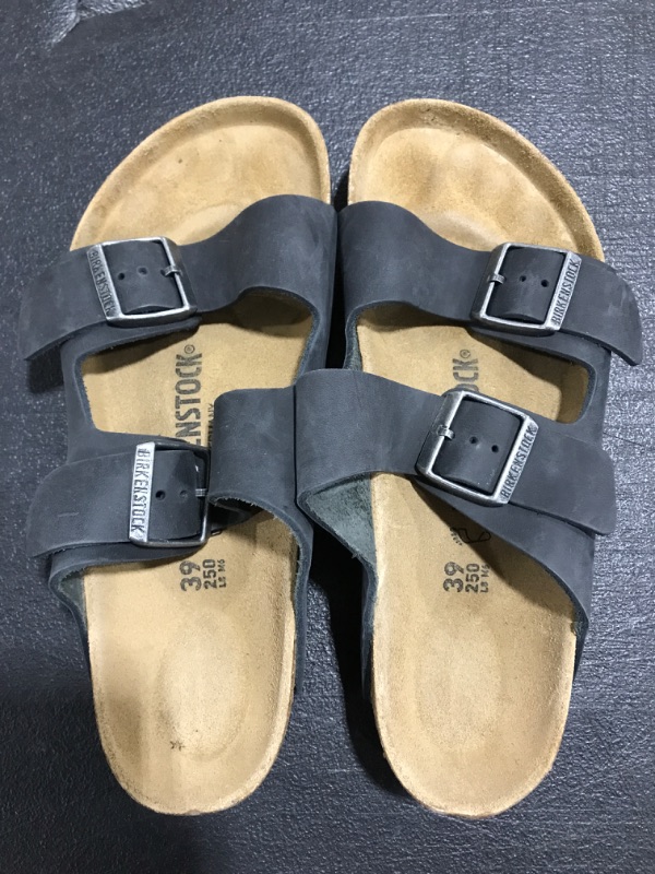 Photo 1 of BIRKENSTOCK SANDALS. BLACK. SIZE 39. PRIOR USE. 