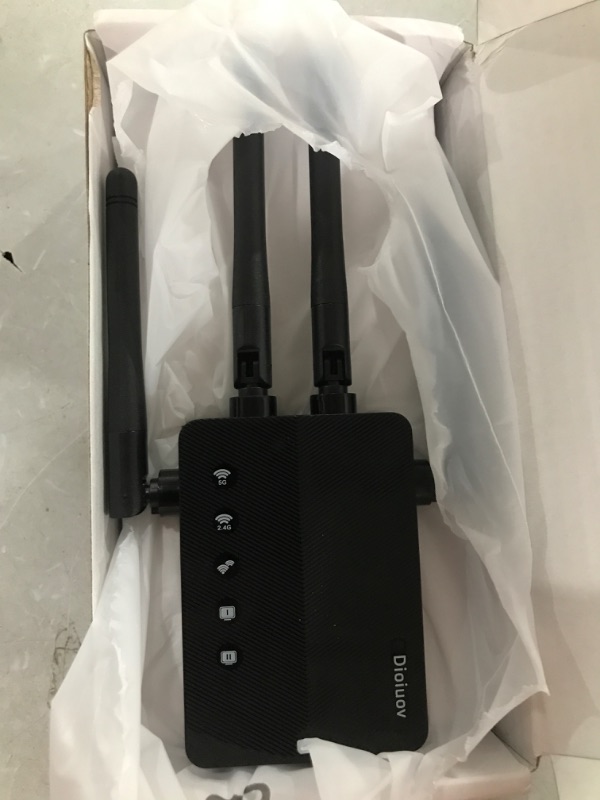 Photo 2 of WiFi Extender 1200 Mbps-2.4 and 5GHz Dual-Band Network-Wireless Amplifier Signal Booster-Wireless Repeater with Smart Signal Indicator