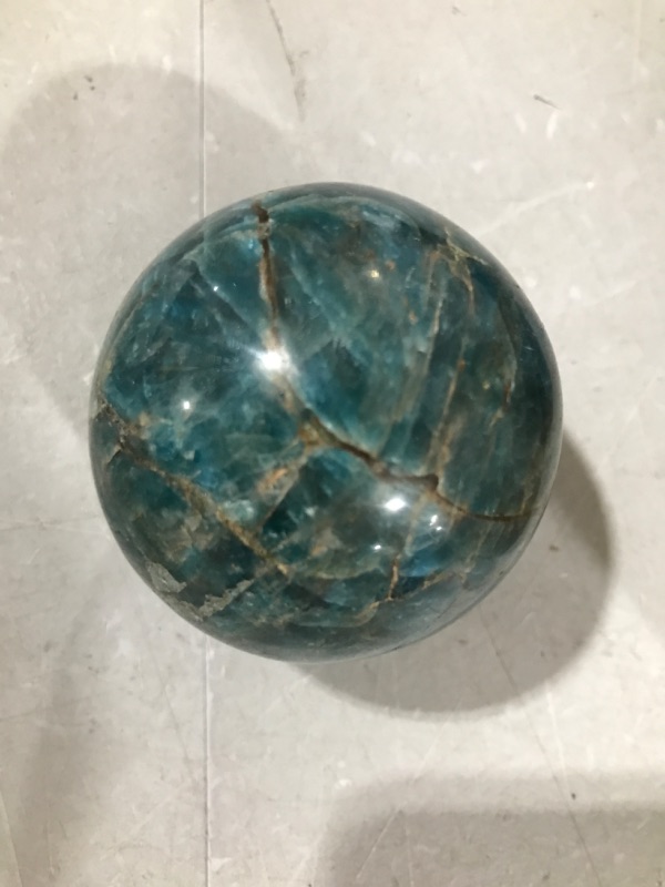 Photo 2 of Crystal Quartz Sphere with Wood Stand Natural Crystal Healing Mineral Love Stone Ball Divination Sphere Sculpture Figurine (Apatite, 60mm) Apatite 60mm