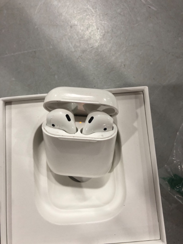 Photo 4 of Apple AirPods with Charging Case (Latest Model)